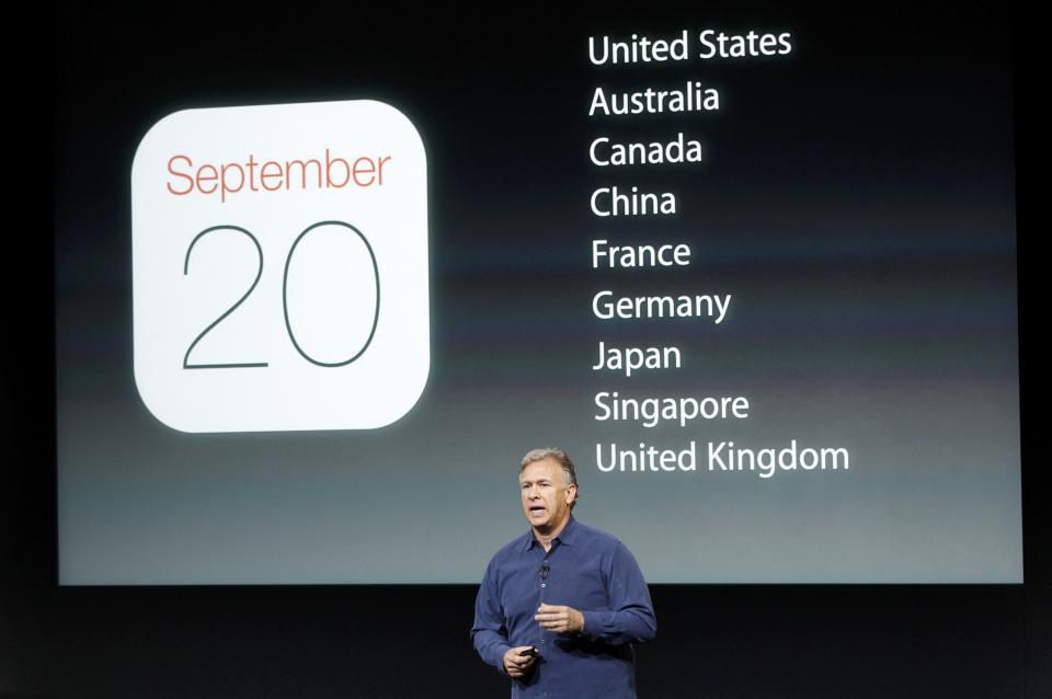 Phil Schiller, senior vice president of worldwide marketing for Apple Inc, talks about the availability of their new products at Apple Inc's media event in Cupertino, California September 10, 2013. REUTERS/Stephen Lam (UNITED STATES - Tags: BUSINESS SCIENCE TECHNOLOGY BUSINESS TELECOMS)