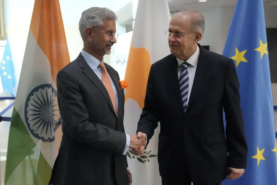 Cyprus' foreign minister Ioannis Kasoulides, right, and his Indian counterpart Subrahmanyam Jaishankar meet at the foreign house in capital Nicosia, Cyprus, Thursday, Dec. 29, 2022. Jaishankar is in Cyprus for a two-day official visit. (AP Photo/Petros Karadjias)