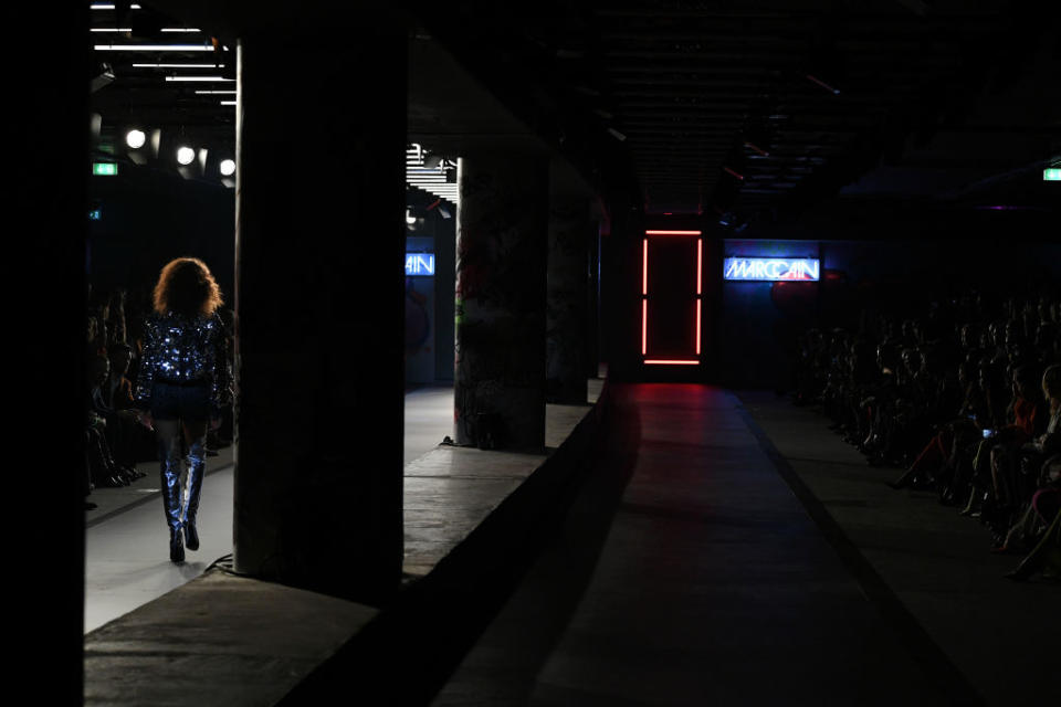 A model walks the runway during the Marc Cain Fashion Show Berlin Autumn/Winter 2018 at metro station Potsdamer Platz on January 16, 2018 in Berlin, Germany.