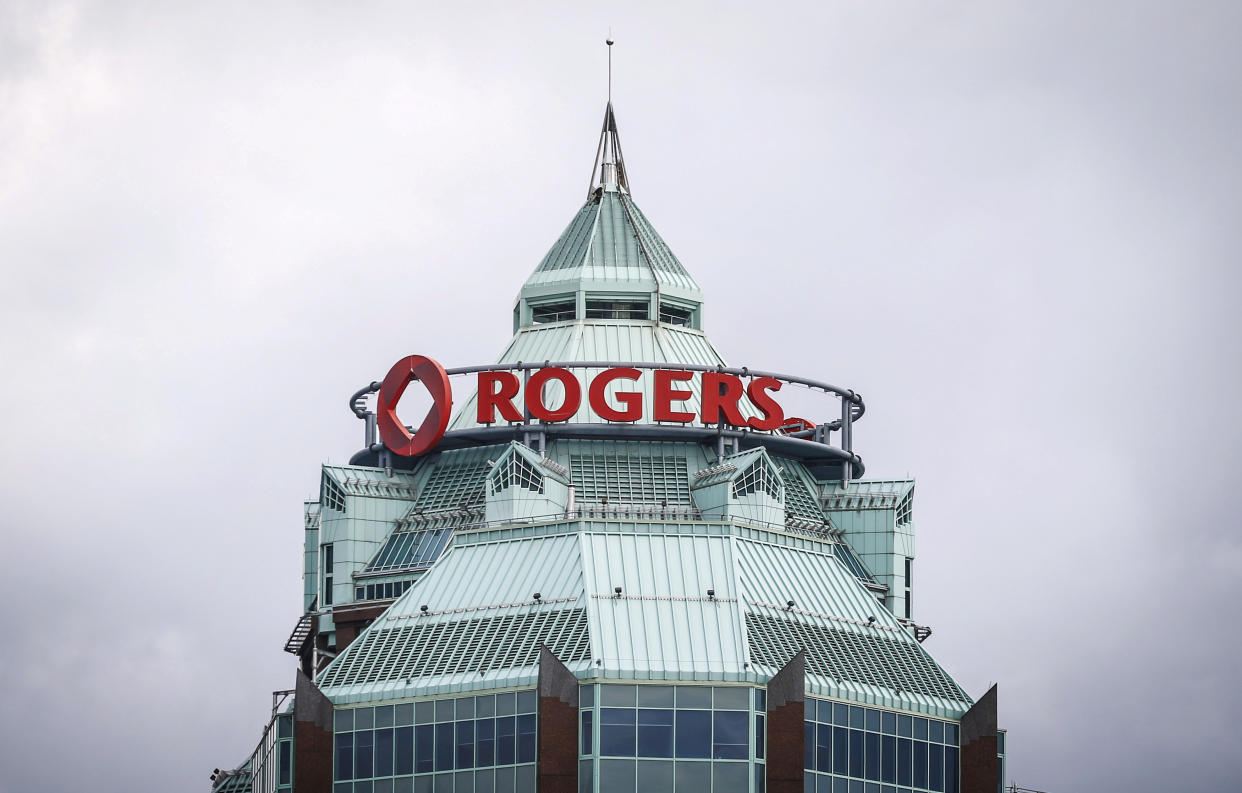 A sign is pictured on top of the Rogers Communications Inc. building on the day of their annual general meeting for shareholders in Toronto, April 21, 2015.    REUTERS/Mark Blinch/File Photo                GLOBAL BUSINESS WEEK AHEAD PACKAGE    SEARCH BUSINESS WEEK AHEAD 17 OCT FOR ALL IMAGES