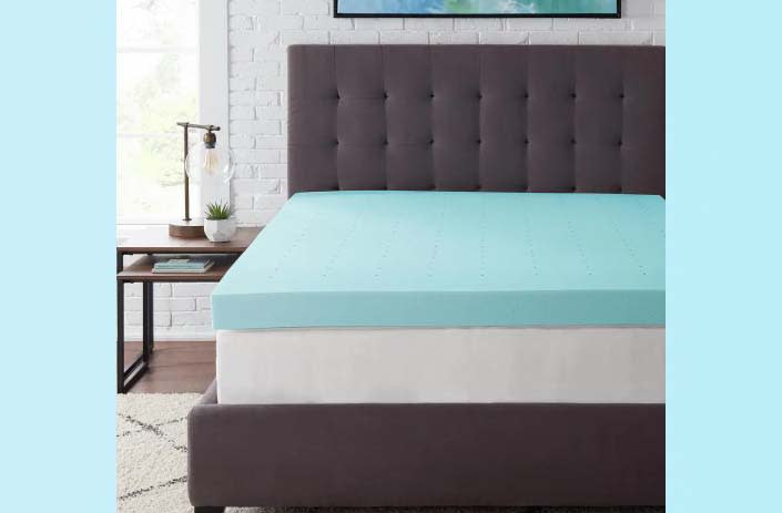 gel mattress on a dark gray bed