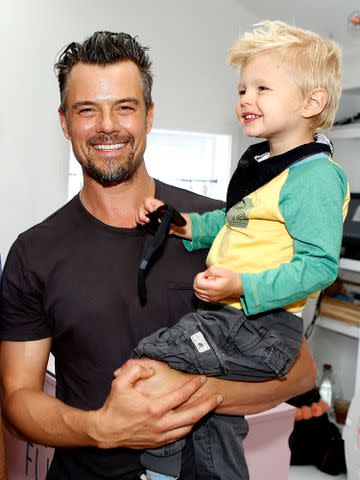 <p>Randy Shropshire/Getty</p> Josh Duhamel and son Axl attend the partnership celebration between TOMS and Oceana in 2016