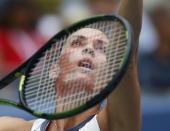 Flavia Pennetta of Italy serves to compatriot Roberta Vinci during their women's singles finals match at the U.S. Open Championships tennis tournament in New York, September 12, 2015. REUTERS/Mike Segar