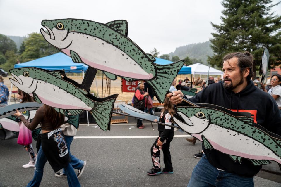 Yurok tribal members celebrate the 59th annual Yurok Salmon Festival in Klamath, California, on Aug. 19, 2023.