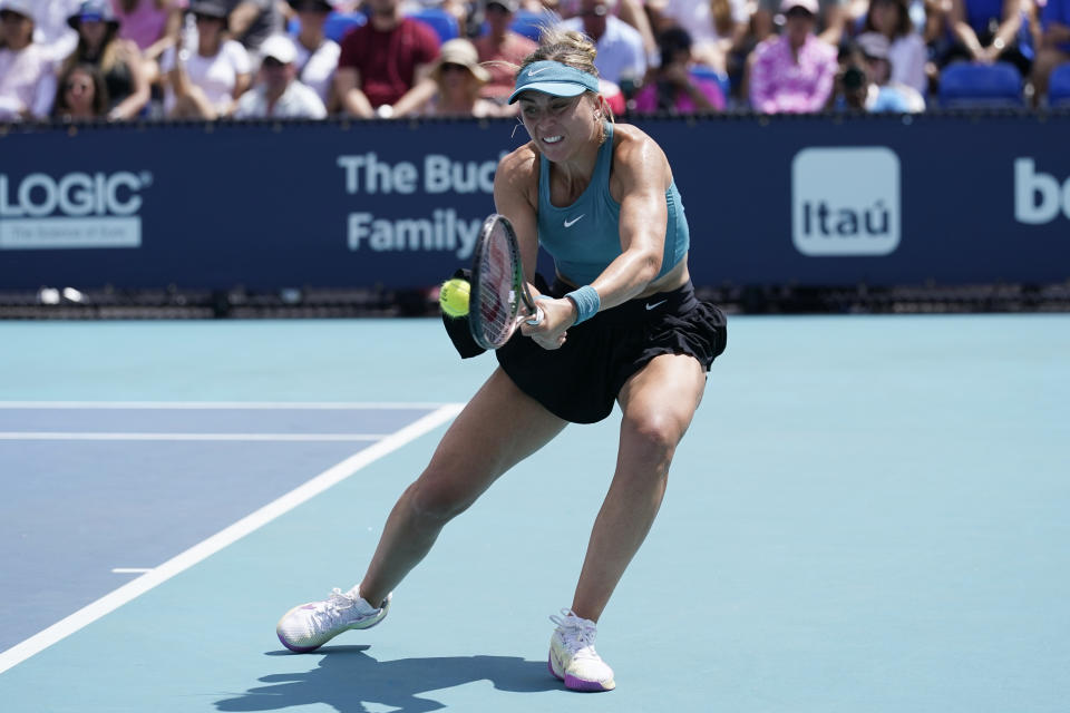 Paula Badosa of Spain returns to Laura Siegemund of Germany during the Miami Open tennis tournament, Thursday, March 23, 2023, in Miami Gardens, Fla. (AP Photo/Marta Lavandier)