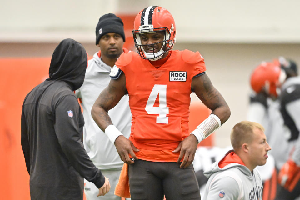 Cleveland Browns quarterback Deshaun Watson (4) stands on the field during an NFL football practice at the team's training facility Wednesday, Nov. 30, 2022, in Berea, Ohio. (AP Photo/David Richard)