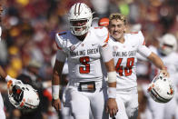 Bowling Green quarterback Matt McDonald (3) smiles in celebration after winning 14-10 against Minnesota during an NCAA college football game Saturday, Sept. 25, 2021, in Minneapolis. (AP Photo/Stacy Bengs)