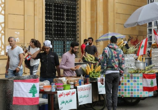 Youth unemployment is chronic in Lebanon, with some young people taking advantage of the protest crowds to help make ends meet