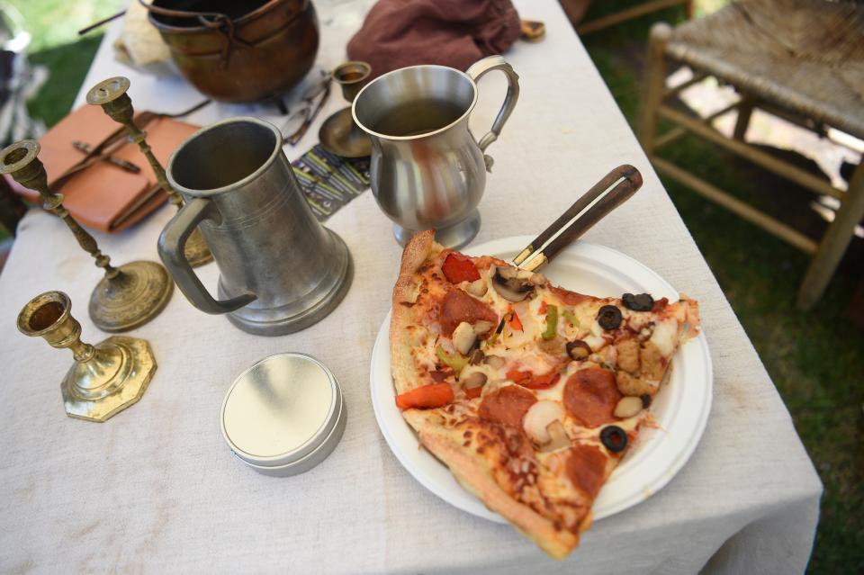 Guests were offered pizza with their tankards and candlesticks during the Knoxville Historic House Museums’ Statehood Day celebration, Saturday, June 3, 2023.
