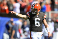 Cleveland Browns quarterback Baker Mayfield celebrates a 33-yard touchdown by running back Demetric Felton during the second half of an NFL football game against the Houston Texans, Sunday, Sept. 19, 2021, in Cleveland. (AP Photo/David Richard)