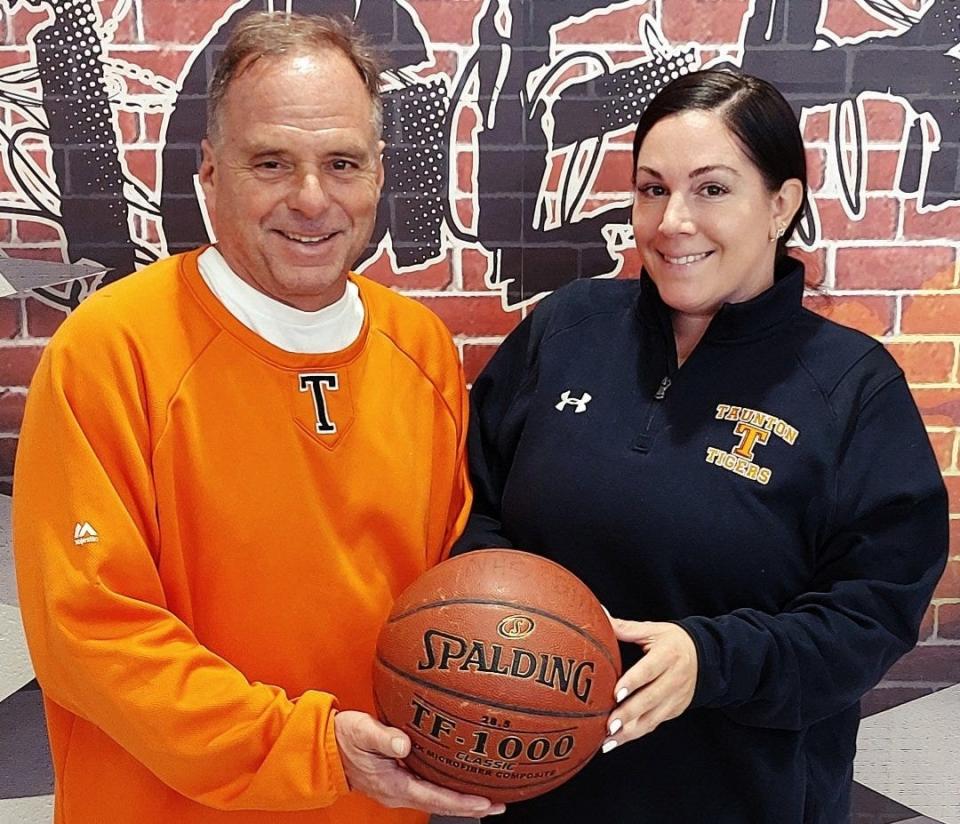 Taunton High School Athletic Director Mark Ottavianelli (left) with new girls basketball coach Gretchen Rodrigues.