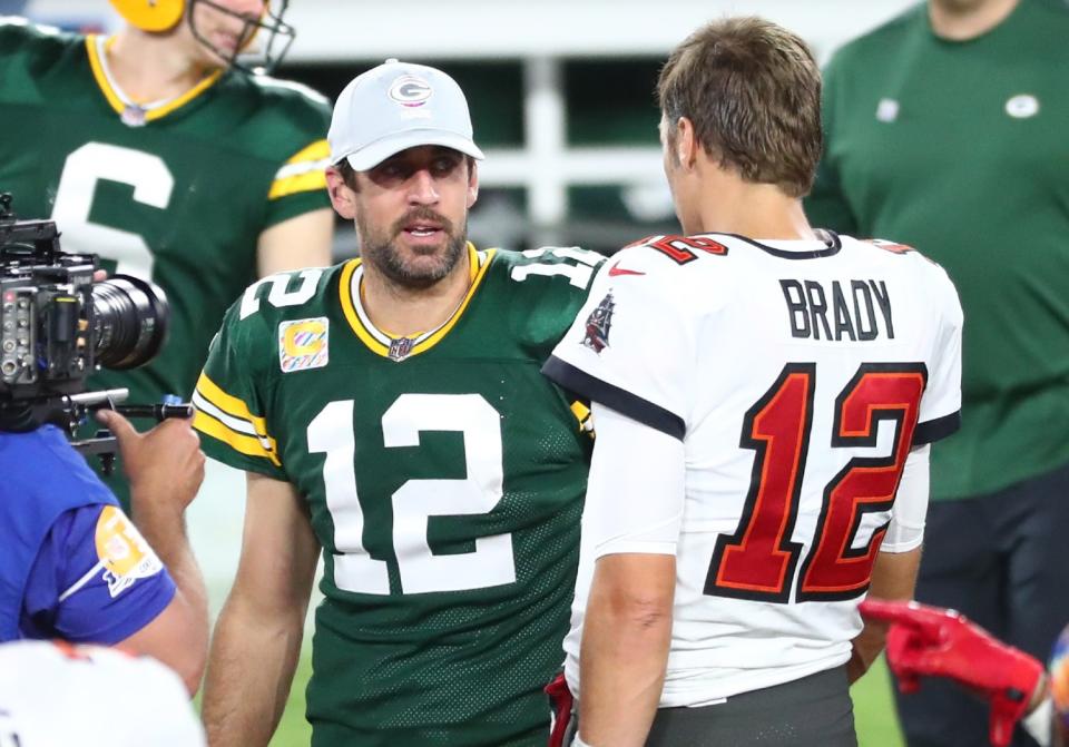 Aaron Rodgers and Tom Brady are returning to their respective teams, and for what they bring to the table, their cap hits are negligible and team-friendly. (Kim Klement-USA TODAY Sports)