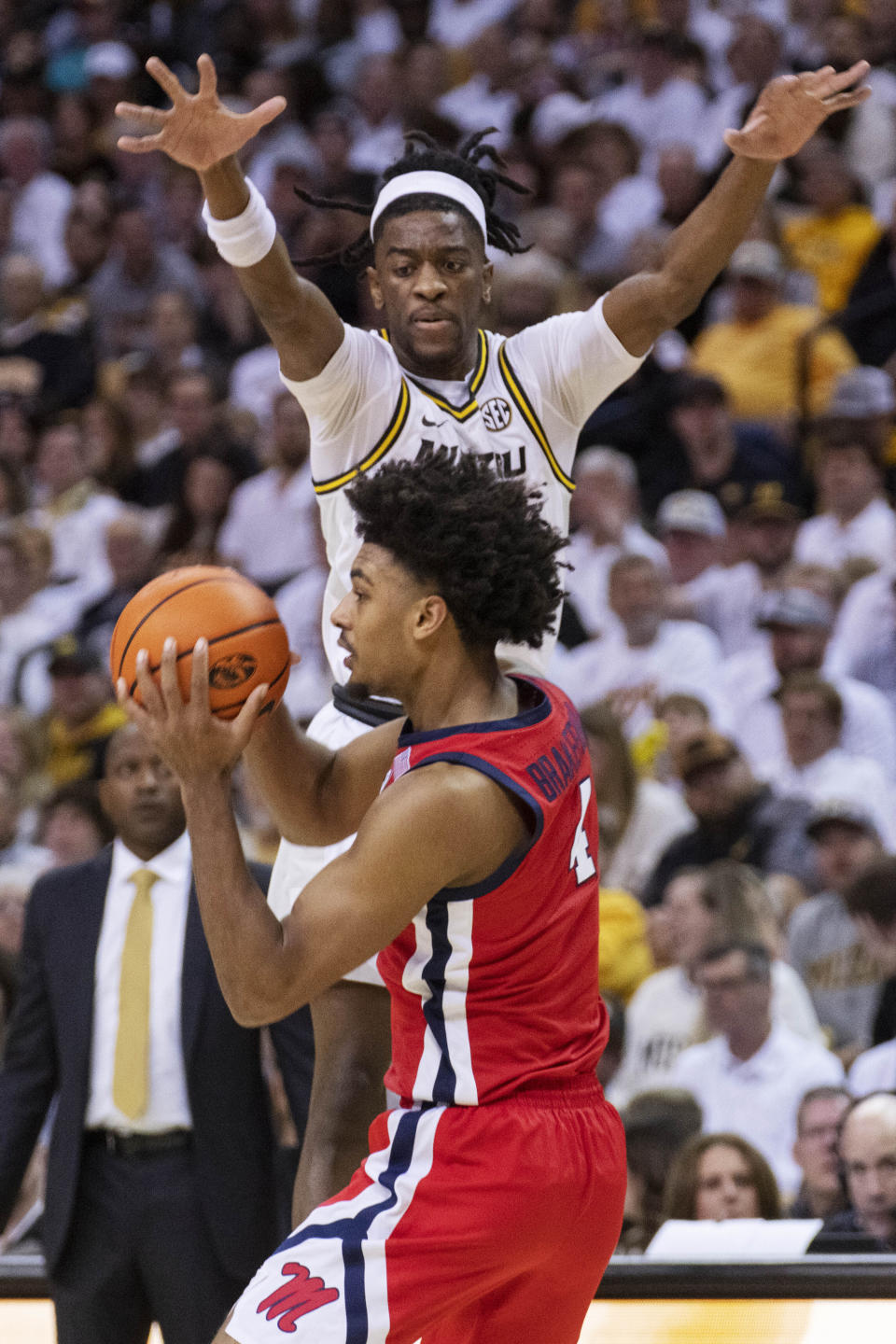 Missouri's Sean East II, top, defends Mississippi's Jaemyn Brakefield during the second half of an NCAA college basketball game Saturday, March 4, 2023, in Columbia, Mo. Missouri won 82-77. (AP Photo/L.G. Patterson)