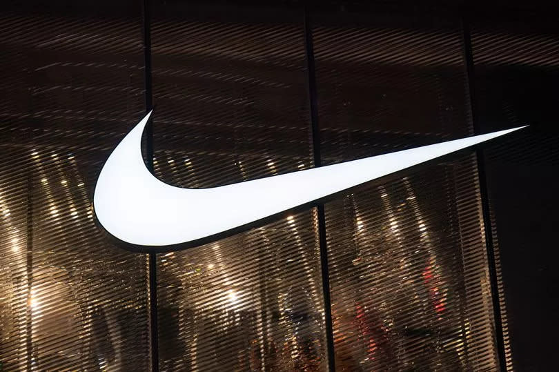 The Nike logo is seen on the facade of a Nike Rise Concept Store on July 19, 2023 in Chongqing, China.