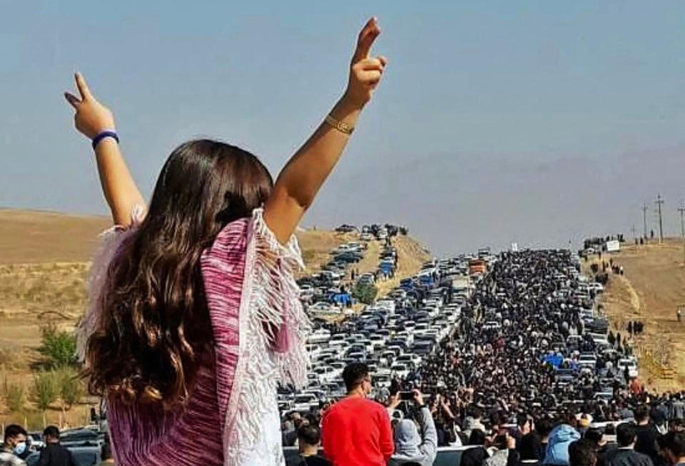 <p>People stretch as far as the eye can see toward Amini's hometown in Iran on Oct. 26. </p>