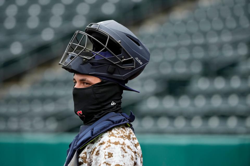 Apr 3, 2024; Columbus, OH, USA; Columbus Clippers catcher Bryan Lavastida (27) warms up prior to the chilly Opening Day game against the Omaha Storm Chasers at Huntington Park.