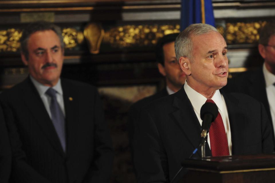 Minnesota Governor Mark Dayton, along with Vikings' owner Zygi Wilf, speaks during a news conference about a deal reached among legislative leaders for a new Vikings stadium, Thursday, March 1, 2012, at the state capitol in St. Paul, Minn. The plan would put the new building nearly on top of the current Metrodome site. (AP Photo/The St. Paul Pioneer Press,Ben Garvin ) MINNEAPOLIS STAR TRIBUNE OUT