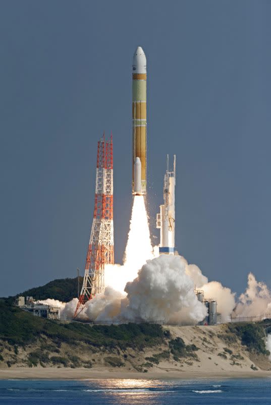 An H3 rocket carrying a land observation satellite lifts off from the launching pad at Tanegashima Space Center on the southwestern island of Tanegashima