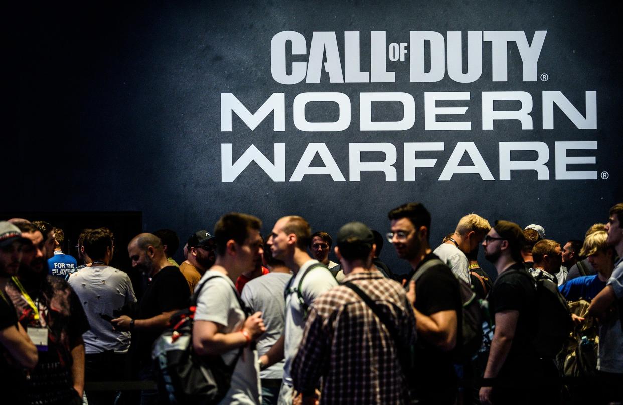 Visitors wait to try out the latest version of Call of Duty Modern Warfare during the press day at the 2019 Gamescom gaming trade fair on August 20, 2019 in Cologne, Germany (Lukas Schulze/Getty Images)