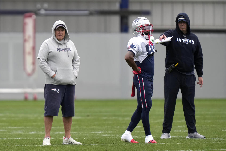 New England Patriots head coach Bill Belichick, left, stands near wide receiver Demario Douglas, center, and offensive coordinator Bill O'Brien, right, during an NFL football practice, Wednesday, Nov. 1, 2023, in Foxborough, Mass. (AP Photo/Steven Senne)