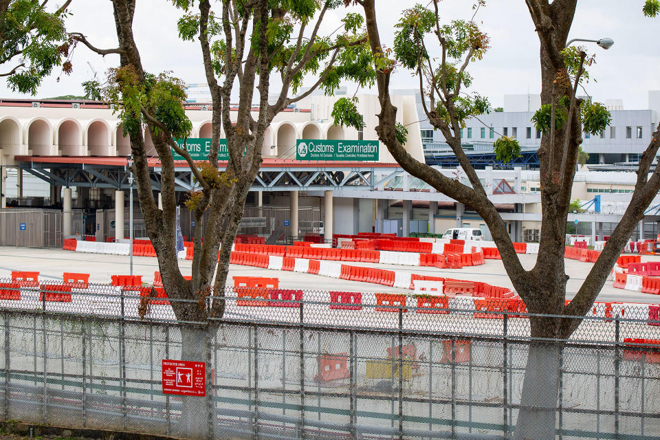 The customs clearance area at the Woodlands Checkpoint seen void of any entering vehicles on 18 March 2020. (PHOTO: Dhany Osman / Yahoo News Singapore)