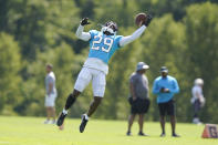 Carolina Panthers cornerback Duke Dawson reaches for the ball during an NFL football joint practice with the New England Patriots, Tuesday, Aug. 16, 2022, in Foxborough, Mass. (AP Photo/Steven Senne)