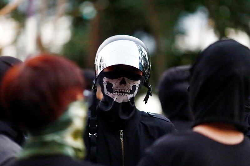 Protesters talk at the campus of the Chinese University in Hong Kong