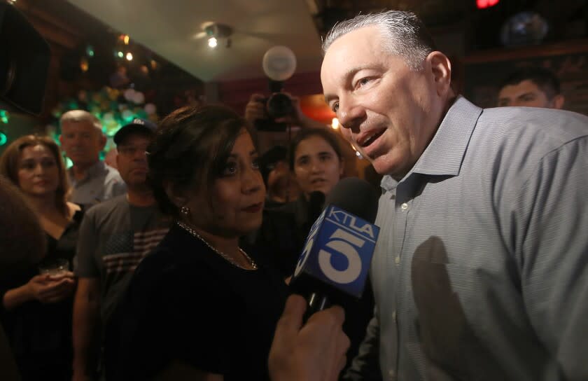 LOS ANGELES, CALIF. - JUNE 7, 2022. Los Angeles County Sheriff Alex Villanueva talks with seporters at an election night gathering in Boyle Heights on Tuesday, June 7, 2022. (Luis Sinco / Los Angeles Times)