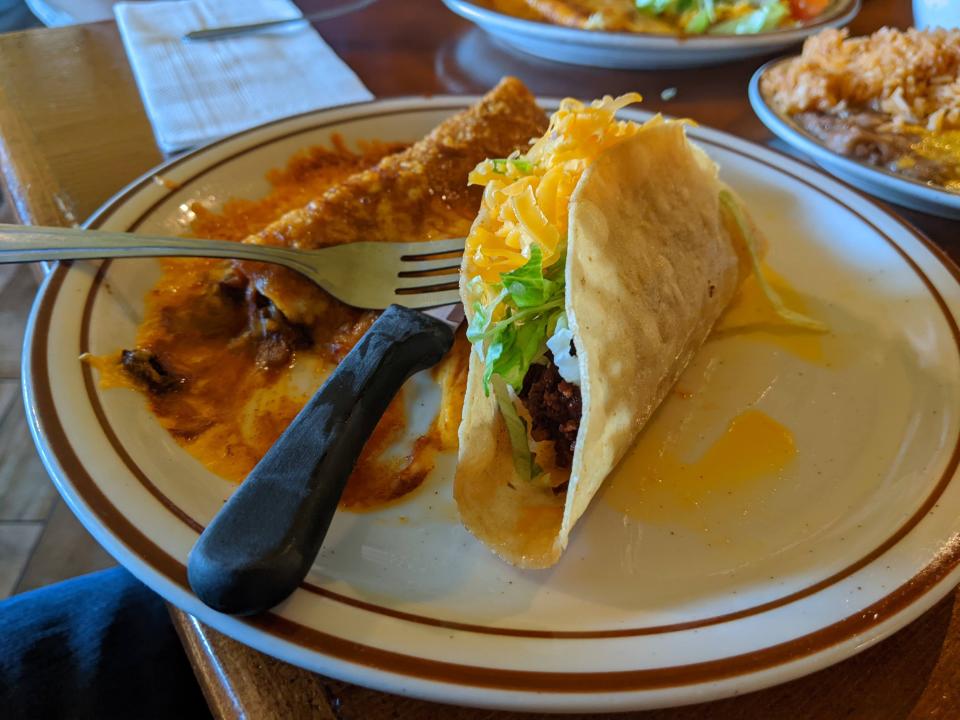 A photo of the original hard-shelled ground beef taco from Mitla Cafe that inspired Glen Bell to create Taco Bell.