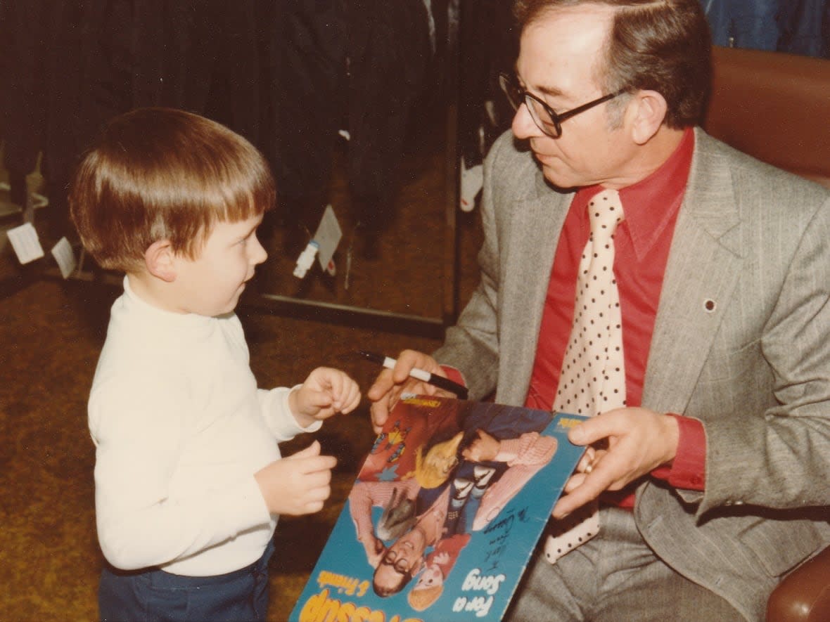 Meeting Ernie Coombs, aka Mr. Dressup, at a Woolco store record-signing in Saint John was a formative moment for Mark Bishop when he was five-and-a-half years old. The now-producer is working on a documentary about the iconic television show.  (Submitted by Mark Bishop - image credit)