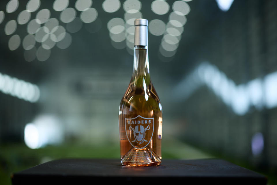 <p>Courtesy of Las Vegas Raiders</p><p>Let's start with the bad news...you can only buy this wine AT Allegiant Stadium where the Las Vegas Raiders play their home games. The good news? IT'S EPIC. The <a href="http://www.raiders.com/" rel="nofollow noopener" target="_blank" data-ylk="slk:Las Vegas Raiders;elm:context_link;itc:0;sec:content-canvas" class="link ">Las Vegas Raiders</a> were the first professional sports organization to name an official head sommelier for their stadium, and the honor went to <a href="http://www.officialsandrataylor.com/" rel="nofollow noopener" target="_blank" data-ylk="slk:Sandra Taylor;elm:context_link;itc:0;sec:content-canvas" class="link ">Sandra Taylor</a>.</p><p>In crafting this rosé Sandra had a little help, which came from one of the best in the business, Gérard Bertrand. Traveling to Gérard's property in Languedoc, France - together they worked tirelessly to find the right blend, one worthy of donning the Raiders' Shield. In the end, they landed on an assemblage of primarily Grenache - with Cinsault, Mourvèdre, and Syrah rounding it out - and a touch of Viognier added for a floral lift.</p><p><a href="https://www.allegiantstadium.com/" rel="nofollow noopener" target="_blank" data-ylk="slk:Click here to check the Raiders' schedule, attend a home game and drink their rosé;elm:context_link;itc:0;sec:content-canvas" class="link ">Click here to check the Raiders' schedule, attend a home game and drink their rosé</a>.</p>