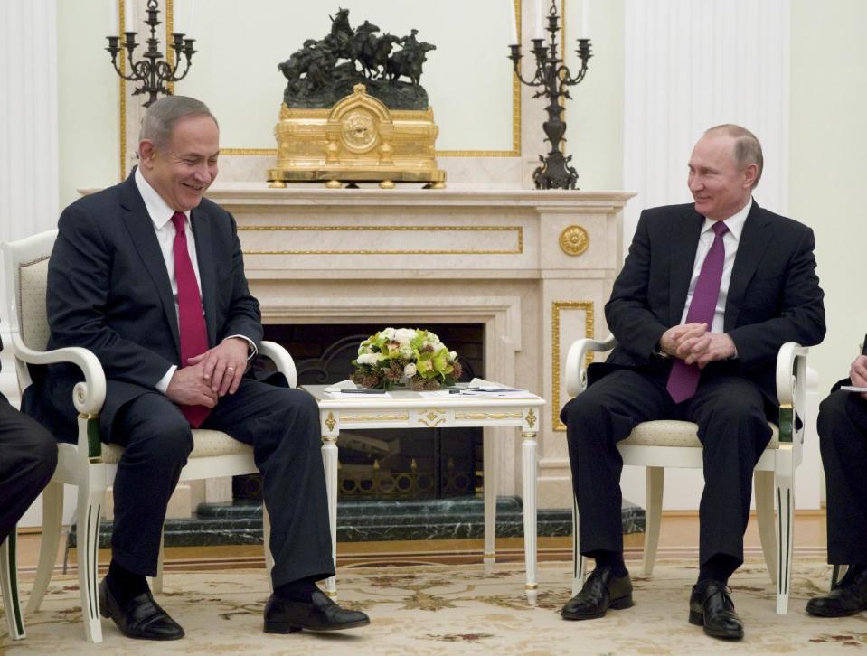 Russian President Vladimir Putin, right, meets with Israeli Prime Minister Benjamin Netanyahu in Moscow, Russia on Thursday, March 9, 2017. Netanyahu visits Moscow for talks with Russian President Vladimir Putin about security issues stemming from Iran's presence in neighbouring Syria. (AP Photo/Pavel Golovkin, pool)