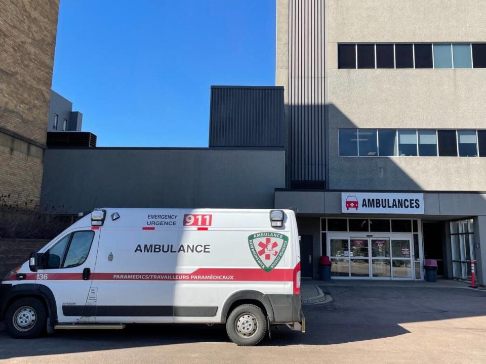 Ambulances are shown parked in front of the Dr. Georges-L.-Dumont University Hospital Centre in April. (Shane Magee/CBC - image credit)