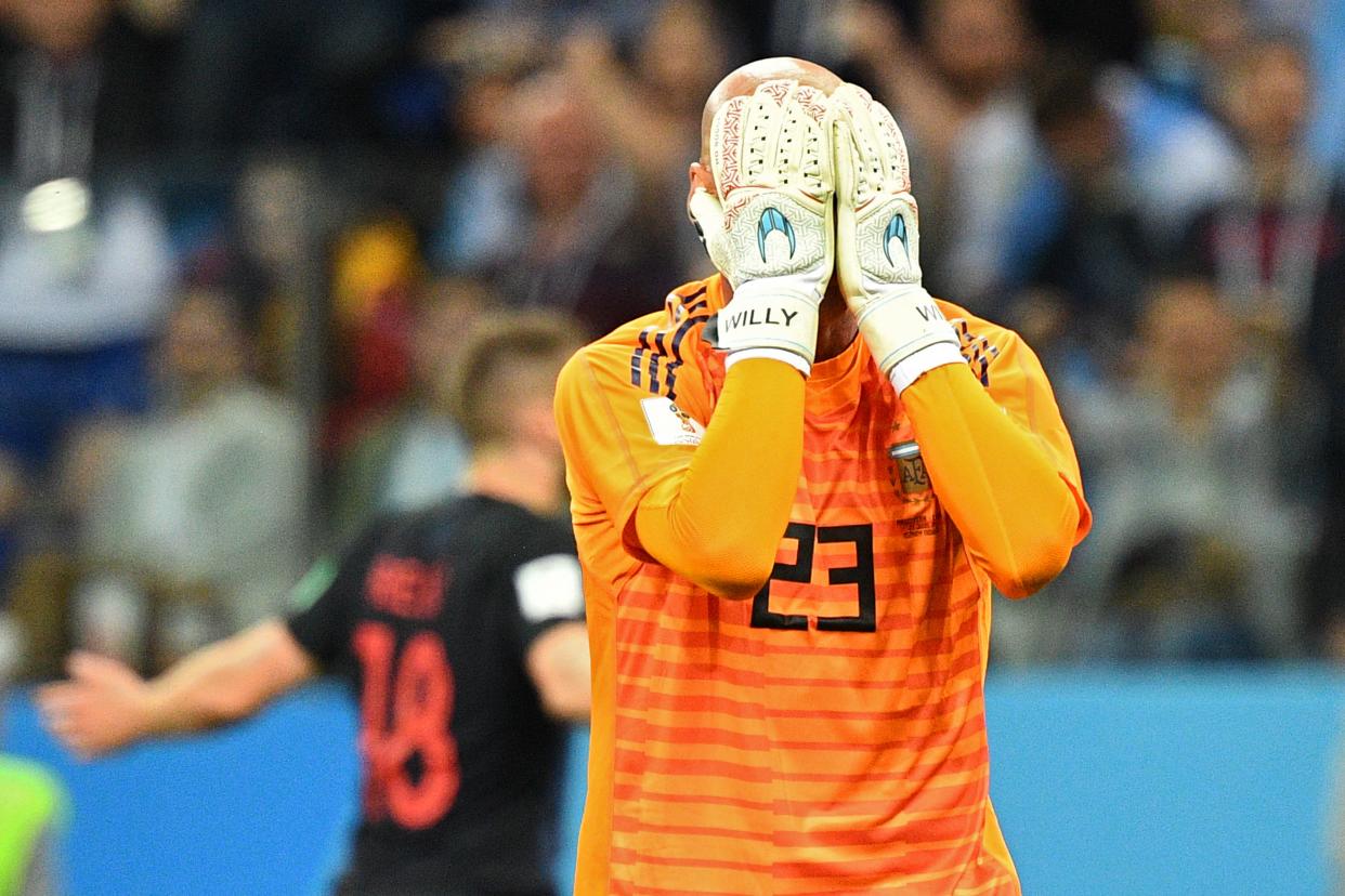 Head in hands: Willy Caballero’s howler leaves Argentina close to an exit