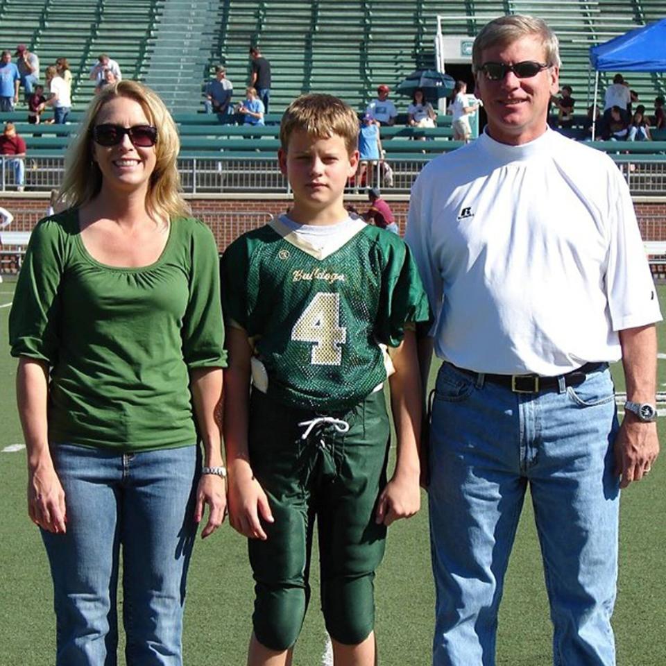 Joe Burrow with his parents