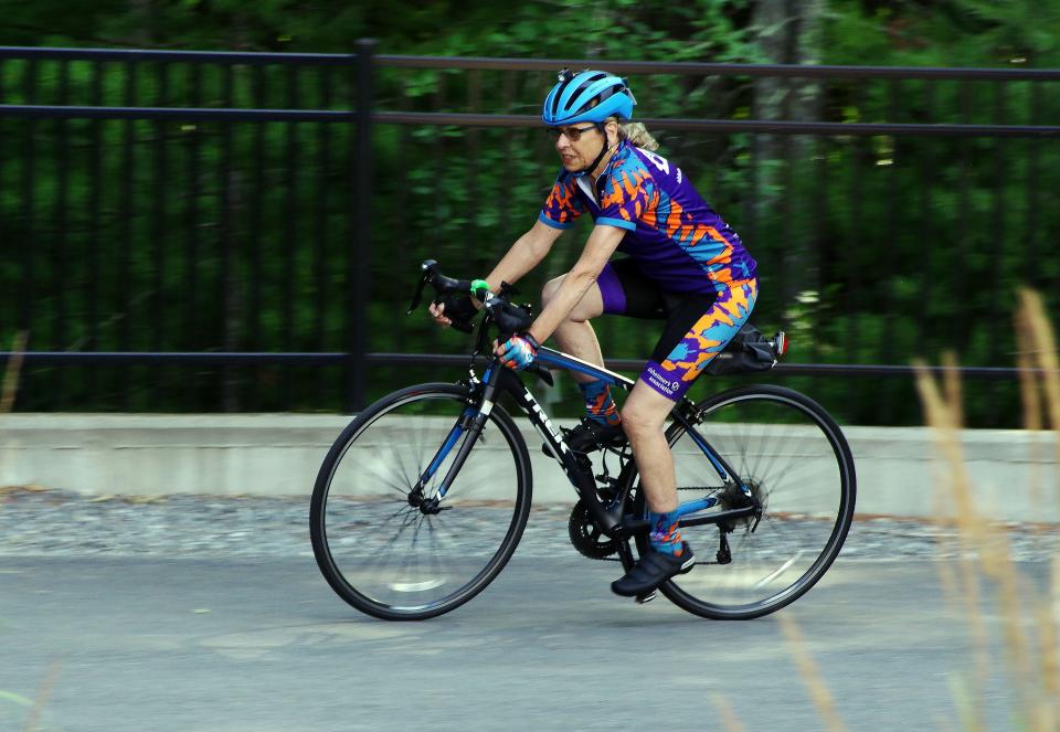 Ann Whaley-Tobin goes for a ride in her Easton neighborhood on Wednesday, July 13, 2022. At 72 years old, Whaley-Tobin rides regularly to raise funds for Alzheimer's research.