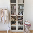 <p> If you're a bit of a fashionista designing a tiny apartment on a budget, look to combo storage solutions that "kill two birds with one stone" as the saying, albeit randomly, goes.  </p> <p> We're swooning at this small closet idea from @makeuploveusa that marries cute shades, hanging lovelies, chicly curated beauty products, and cosmetics into a boutique-inspired accessories display.  </p>