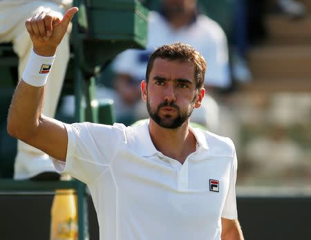 Tennis - Wimbledon - London, Britain - July 5, 2017 Croatia’s Marin Cilic celebrates winning the second round match against Germany’s Florian Mayer REUTERS/Andrew Couldridge