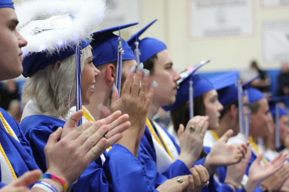 INDIAN RIVER Ñ Thursday evening, Inland Lakes High School hosted its commencement ceremonies for the graduating Class of 2022 in the high school gymnasium, ushering the 43 seniors into the next phase of their lives.Due to the weather in the area, the ceremony originally scheduled to take place at Shanley Field, the school district's football field, was moved inside, but that didn't dampen the excitement the students were feeling.This year's co-valedictorians were Alyssa Byrne, Nevin Thompson, Ty Thompson and Megan Vigneau, with the class salutatorian being Emily Van Daele, each of which gave speeches. The students gave their fellow graduates words of encouragement and shared memories of their last 13 years in school together.The graduating seniors were also allowed to decorate the tops of their graduation caps to reflect their personal style. Some chose lights and feathers, others chose to highlight their after graduation plans, and one student had all of her classmates sign the top of her cap.