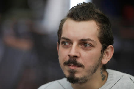 Alex Andronic reacts during an interview with Reuters on the terrace of his bistro in Bucharest, Romania, October 1, 2018. Picture taken October 1, 2018. Inquam Photos/Octav Ganea via REUTERS