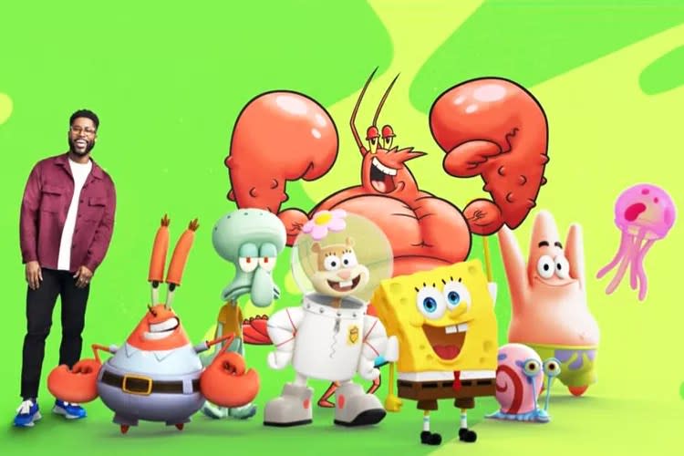 CBS Sports analyst Nate Burleson with cast of SpongeBob SquarePants for Nickelodeon Super Bowl.