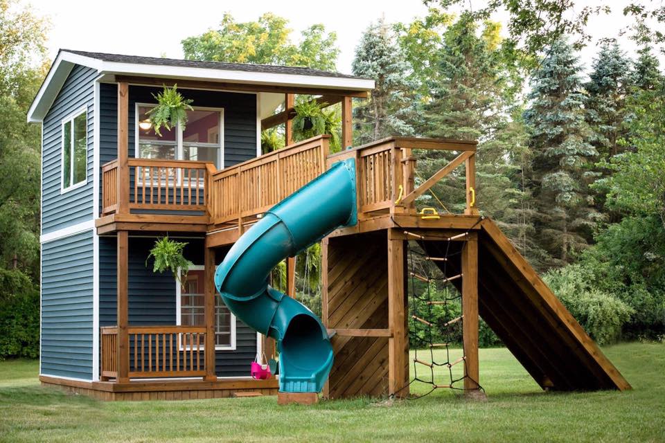 The back of the house has a slide, swing set and more. (Flashes of Life photography)