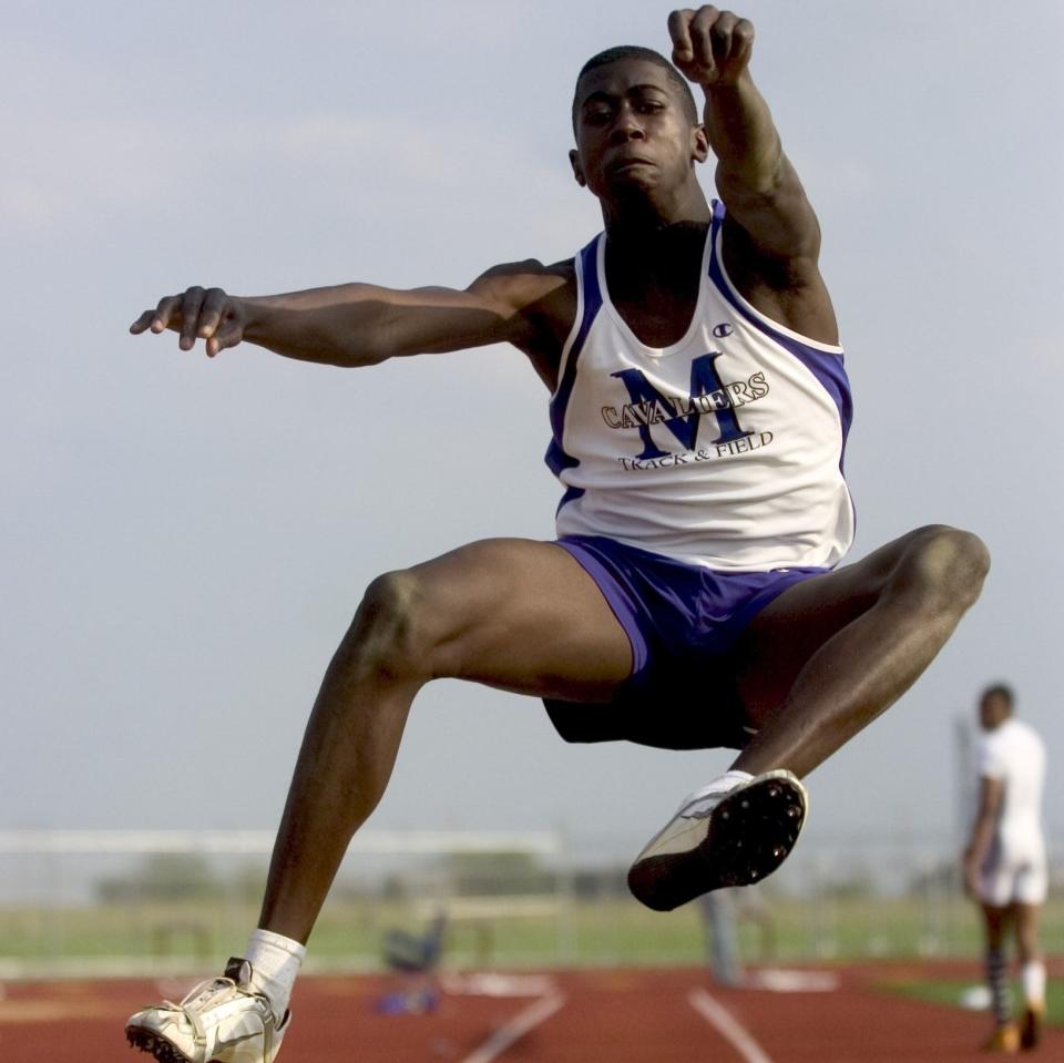 Marquis Dendy, 15, of Middletown, gets a jump of 21'3" for Middletown during the Blue Hen Conference Championships in Middletown Wednesday April 30, 2008.