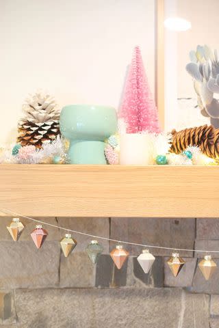 <p><a href="https://lovelyindeed.com/quick-easy-diy-ornament-garland-for-your-mantel/" data-component="link" data-source="inlineLink" data-type="externalLink" data-ordinal="1">Lovely Indeed</a></p>