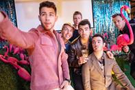 Nick, Joe and Kevin Jonas pose for a selfie with Jack McBrayer, Josh Meyers and host Seth Meyers during the "Day Drinking with the Jonas Brothers" sketch on <i>Late Night with Seth Meyers </i>in N.Y.C. on Tuesday.