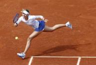 Maria Sharapova of Russia plays a shot to Kaia Kanepi of Estonia during their women's singles match at the French Open tennis tournament at the Roland Garros stadium in Paris, France, May 25, 2015. REUTERS/Jean-Paul Pelissier