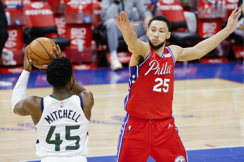 Ben Simmons #25 of the Philadelphia 76ers guards Donovan Mitchell #45 of the Utah Jazz during the fourth quarter at Wells Fargo Center on March 03, 2021 in Philadelphia, Pennsylvania. NOTE TO USER: User expressly acknowledges and agrees that, by downloading and or using this photograph, User is consenting to the terms and conditions of the Getty Images License Agreement. (Photo by Tim Nwachukwu/Getty Images)