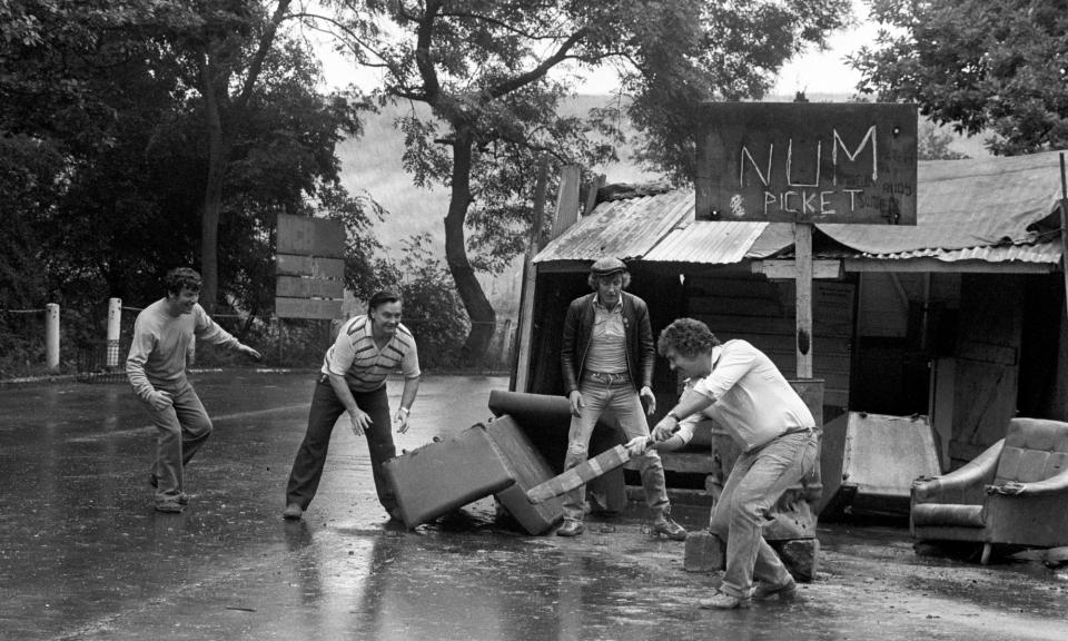 <span>Pickets relax with a makeshift game of cricket outside the Maltby colliery near Rotherham in August 1984.</span><span>Photograph: PA Images/Alamy</span>