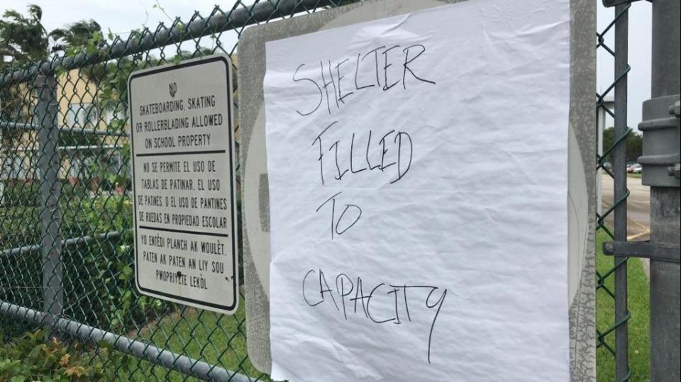 MIRAMAR, FL- September 09: Shelter filled to capacity sign hangs on a fence.&nbsp;