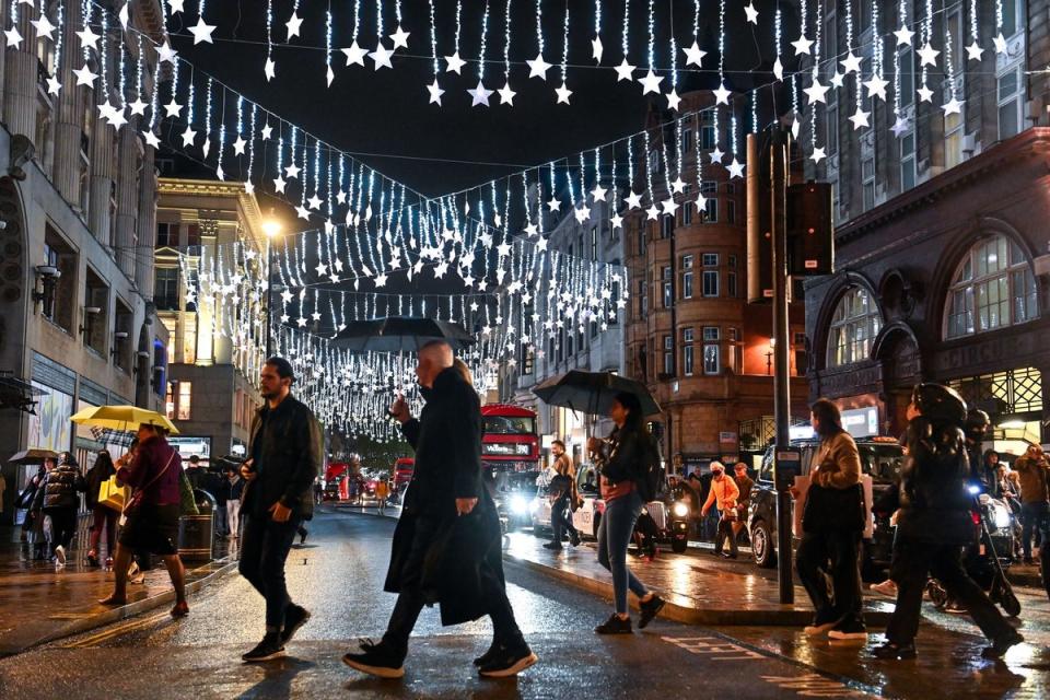 People in Oxford Street during the festive seaon (PA)